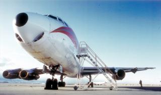 This DC–8 cargo aircraft encountered extreme clear–air turbulence over the Colorado Rocky Mountains on 9 Dec 1992, resulting in the loss of the right outboard engine and part of the right wing. (Photo courtesy of the Denver Post)